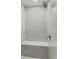 Clean shower with built-in seat and modern fixtures at 1708 Evenstad Way, Smyrna, GA 30080