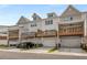 Three-story townhomes with attached garages and private decks at 1708 Evenstad Way, Smyrna, GA 30080