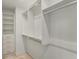 Large walk-in closet with hanging rods and shelving at 1708 Evenstad Way, Smyrna, GA 30080