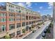 Brick building with shops on the ground level and residential units above at 260 18Th Nw St # 10311, Atlanta, GA 30363