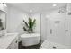 Modern bathroom with soaking tub and walk-in shower at 260 18Th Nw St # 10311, Atlanta, GA 30363