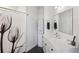 Bathroom with white vanity, shower and hexagon floor tiles at 260 18Th Nw St # 10311, Atlanta, GA 30363