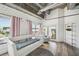 Bright bedroom with large windows and a comfortable daybed at 260 18Th Nw St # 10311, Atlanta, GA 30363