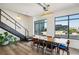 Mid-century modern dining set in open concept space with city views at 260 18Th Nw St # 10311, Atlanta, GA 30363