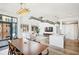 Bright dining room with hardwood floors and modern chandelier at 260 18Th Nw St # 10311, Atlanta, GA 30363