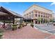 Building exterior, showcasing restaurant patio seating and street views at 260 18Th Nw St # 10311, Atlanta, GA 30363
