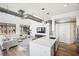 Modern kitchen with white cabinetry, quartz countertops, and stainless steel appliances at 260 18Th Nw St # 10311, Atlanta, GA 30363