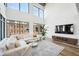 Modern living room featuring hardwood floors, large windows, and comfortable seating at 260 18Th Nw St # 10311, Atlanta, GA 30363