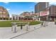 Relaxing outdoor plaza with artificial turf, seating, and modern design at 260 18Th Nw St # 10311, Atlanta, GA 30363