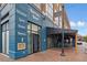 Restaurant exterior with outdoor seating and blue brick facade at 260 18Th Nw St # 10311, Atlanta, GA 30363