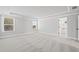 Large bedroom offering neutral walls, plush carpeting, and abundant natural light through multiple windows at 313 Foxglove Way, Mcdonough, GA 30253