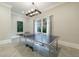 Basement game room features a ping pong table and large windows at 9680 Almaviva Dr, Alpharetta, GA 30022