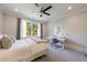 Bedroom with a window and built in desk at 9680 Almaviva Dr, Alpharetta, GA 30022