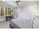 Bedroom with window seat and built-in workspace at 9680 Almaviva Dr, Alpharetta, GA 30022