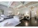 Bright main bedroom with sitting area and access to private balcony at 9680 Almaviva Dr, Alpharetta, GA 30022