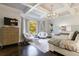 Luxurious main bedroom with sitting area and tray ceiling at 9680 Almaviva Dr, Alpharetta, GA 30022