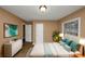 Spacious bedroom with neutral walls and wood-look flooring at 1881 Broad Ave, East Point, GA 30344