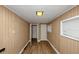 Bright hallway with light walls and wood-look flooring at 1881 Broad Ave, East Point, GA 30344