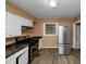 Updated kitchen with stainless steel appliances at 1881 Broad Ave, East Point, GA 30344