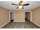 Living room with hardwood floors and high ceilings at 1881 Broad Ave, East Point, GA 30344
