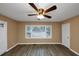 Bright living room featuring large windows at 1881 Broad Ave, East Point, GA 30344