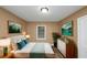 Spacious main bedroom with wood-look flooring and large window at 1881 Broad Ave, East Point, GA 30344