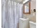Bathroom features a shower with neutral tile and white fixtures at 1931 Oana Sw St, Atlanta, GA 30310