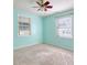 Bright, airy bedroom with neutral carpeting and a ceiling fan at 1931 Oana Sw St, Atlanta, GA 30310