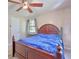 Cozy bedroom features a ceiling fan, carpeted floors and natural light at 1931 Oana Sw St, Atlanta, GA 30310