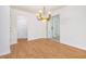 Bright dining room with hardwood floors, a sliding glass door and a decorative chandelier at 1931 Oana Sw St, Atlanta, GA 30310
