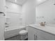 Bathroom features shower/tub combo, vanity with sink, and bronze fixtures at 236 Begonia Way, Mcdonough, GA 30253