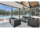 Inviting outdoor lounge area by community pool with comfortable seating under a vaulted ceiling structure at 236 Begonia Way, Mcdonough, GA 30253