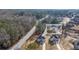 Aerial view of two houses and surrounding area at 4400 Ross Estates Ct, Snellville, GA 30039