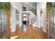 Grand foyer showcasing hardwood floors, soaring ceilings, elegant staircase, and open floor plan at 5669 Hollowbrooke Nw Ln, Acworth, GA 30101