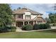 Beautiful two-story home with a stone and siding exterior, lovely landscaping and a welcoming front porch at 5669 Hollowbrooke Nw Ln, Acworth, GA 30101