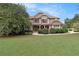Charming two-story home with stone accents, a well-maintained lawn, and inviting curb appeal at 5669 Hollowbrooke Nw Ln, Acworth, GA 30101