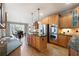 Spacious kitchen with granite counters, stainless appliances, and a center island at 5669 Hollowbrooke Nw Ln, Acworth, GA 30101