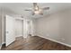 Spacious bedroom with ceiling fan and access to bathroom at 1402 Huntingdon, Atlanta, GA 30350