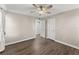 Bedroom with ceiling fan and access to walk-in closet at 1402 Huntingdon, Atlanta, GA 30350