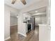 Modern kitchen with white cabinets and stainless steel appliances at 1402 Huntingdon, Atlanta, GA 30350