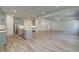 Open concept kitchen with gray cabinets and island at 62 Homesite Cooper W Cv, Fayetteville, GA 30215