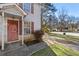 Front entrance of house with walkway and landscaping at 9119 Fairway Ct, Riverdale, GA 30274