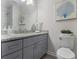 Bathroom boasts granite vanity and updated fixtures at 1004 Mainstreet Lake Dr, Stone Mountain, GA 30088