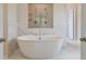 Luxurious bathroom with a large soaking tub and glass shower at 21 Homesite Cooper E Cv, Fayetteville, GA 30215