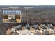 A beautiful aerial view of a home in a cul-de-sac surrounded by trees at 4770 Alford Commons, Cumming, GA 30028