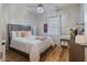 Charming bedroom with a comfortable bed and plenty of light at 4770 Alford Commons, Cumming, GA 30028