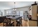 Bright dining area with farmhouse table and French doors at 4770 Alford Commons, Cumming, GA 30028
