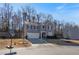 Charming two-story home with a well-maintained lawn and a basketball hoop for recreational fun at 4770 Alford Commons, Cumming, GA 30028