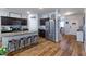Spacious kitchen boasts granite countertops, stainless steel appliances and an island at 4770 Alford Commons, Cumming, GA 30028