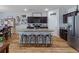 Modern kitchen with granite countertops, stainless steel appliances, and an island at 4770 Alford Commons, Cumming, GA 30028